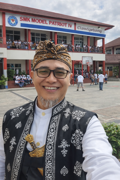 H. Andi Yulia Riadi, S. Sos., M. I. Kom. 